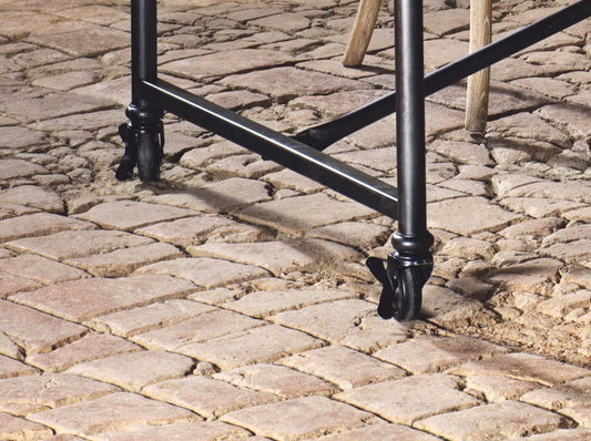 Linden table in aged pine and iron with wheels, elegance and f